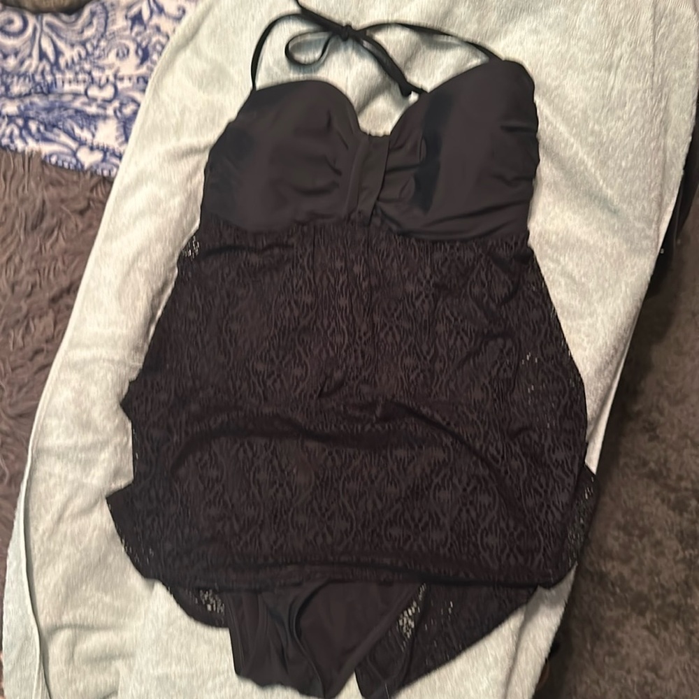 Glamorous lacy black one piece with straps. EUC size 16